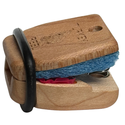 Wooden hinging diaphragm Turkey Call with a black rubber o ring and and enclosed double latex reed inside